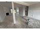 A spacious living room with a fireplace, trimwork, and lots of natural light at 47 Royal Ave, Selma, NC 27576