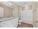 Bathroom features a granite countertop vanity, toilet, and a shower-tub combination at 48 Silver Ct, Smithfield, NC 27577