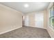 Spacious bedroom with neutral walls and a window that provides natural light at 48 Silver Ct, Smithfield, NC 27577