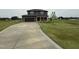 A charming two-story home with an attached garage and long driveway at 48 Silver Ct, Smithfield, NC 27577