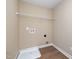 Dedicated laundry room with hook-ups and overhead storage at 48 Silver Ct, Smithfield, NC 27577