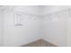 This closet features shelving and carpeting with neutral paint at 53 Barony Ln, Smithfield, NC 27577