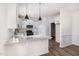Bright kitchen with white cabinets, stainless steel appliances, and granite countertop at 53 Barony Ln, Smithfield, NC 27577