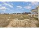 A spacious backyard is ready for personalization and landscaping at 54 Barony Ln, Smithfield, NC 27577
