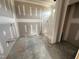 Well-lit bathroom featuring a shower ready for finishing with modern fixtures at 56 Bailey-Boykin Rd, Selma, NC 27576