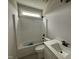 Bathroom featuring shower and tub with tiled floor and modern vanity at 56 Bailey-Boykin Rd, Selma, NC 27576