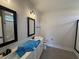 Bathroom featuring double vanity, granite countertops, and walk-in shower at 56 Bailey-Boykin Rd, Selma, NC 27576