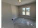 Bedroom with a window for natural light at 56 Bailey-Boykin Rd, Selma, NC 27576