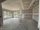 Bright, spacious living room featuring large windows, ready for customization and design at 56 Bailey-Boykin Rd, Selma, NC 27576