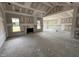 Bright, spacious living room featuring large windows and a fireplace, ready for customization at 56 Bailey-Boykin Rd, Selma, NC 27576