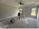 Large, unfinished main bedroom with tray ceilings and bright windows offering great light at 56 Bailey-Boykin Rd, Selma, NC 27576