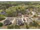 Aerial view of neighborhood with well maintained lawns and beautiful trees at 5928 Terrington Ln, Raleigh, NC 27606