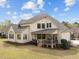 Beautiful home with a covered patio and a large, well-maintained backyard at 5928 Terrington Ln, Raleigh, NC 27606