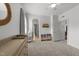 Spacious Bedroom featuring neutral carpet, changing table and bookshelf for baby at 5928 Terrington Ln, Raleigh, NC 27606