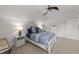 Bright bedroom with neutral walls, a ceiling fan and neutral carpet at 5928 Terrington Ln, Raleigh, NC 27606