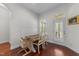 Cozy breakfast nook with natural light and a rustic dining set at 5928 Terrington Ln, Raleigh, NC 27606