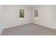 Bedroom with carpet flooring and view from the windows at 609 Tuscany Cir, Princeton, NC 27569