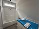 Bathroom with modern countertop and bathtub/shower combo, combining functionality with contemporary design at 612 Tuscany Cir, Princeton, NC 27569