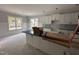 Modern kitchen features white cabinets, subway tile backsplash, and a large island with stylish countertop at 612 Tuscany Cir, Princeton, NC 27569