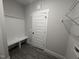 Convenient mudroom with built-in bench, storage, and stylish design details at 612 Tuscany Cir, Princeton, NC 27569