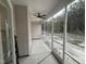 Screened patio with ceiling fan, ideal for enjoying the outdoors at 612 Tuscany Cir, Princeton, NC 27569
