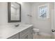 Bathroom vanity with sink, mirror, and cabinet at 613 Tuscany Cir, Princeton, NC 27569
