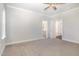 Bedroom with en suite bathroom, features neutral carpet and wall colors at 613 Tuscany Cir, Princeton, NC 27569