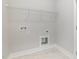 Laundry room with tile flooring and hook ups for appliances at 613 Tuscany Cir, Princeton, NC 27569