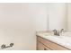 Powder room featuring a granite counter on a wood cabinet below a framed mirror with an oil rubbed bronze faucet at 68 Tee Dr, Selma, NC 27576