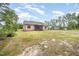 A well-maintained house with a large yard and screened porch, ideal for outdoor activities and relaxation at 702 Tuscany Cir, Princeton, NC 27569