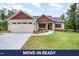 Charming home featuring a two-car garage, craftsman details, and a well-manicured lawn at 702 Tuscany Cir, Princeton, NC 27569
