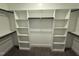Spacious walk-in closet with custom shelving and ample storage for an organized wardrobe at 702 Tuscany Cir, Princeton, NC 27569