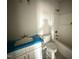 Bathroom featuring a tub shower, single vanity, and hexagon tile flooring at 71 Royal Ave, Selma, NC 27576