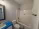 Clean bathroom with a bathtub and a modern vanity at 71 Royal Ave, Selma, NC 27576