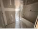Unfinished bathroom equipped with a new bathtub, ready for you to customize your relaxation space at 71 Royal Ave, Selma, NC 27576