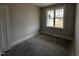 Bright room featuring a window view and neutral paint, offering a blank canvas for customization at 71 Royal Ave, Selma, NC 27576