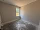 Cozy bedroom with a window, perfect for relaxation and rest at 71 Royal Ave, Selma, NC 27576
