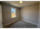 Cozy bedroom featuring a window overlooking the yard at 71 Royal Ave, Selma, NC 27576