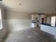 Eat in kitchen featuring stylish, white cabinets and bar top at 71 Royal Ave, Selma, NC 27576