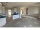 Open floor plan with kitchen island and views of living room, great for entertaining at 71 Royal Ave, Selma, NC 27576