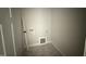 Laundry room features washer and dryer hookups, and neutral wall paint at 71 Royal Ave, Selma, NC 27576
