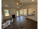 Open-concept living room with fireplace and adjacent kitchen and dining area at 71 Royal Ave, Selma, NC 27576