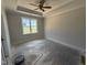Main bedroom showcasing natural light and a tray ceiling, providing a peaceful retreat at 71 Royal Ave, Selma, NC 27576