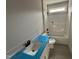 Clean bathroom featuring tub, white vanity, and tile flooring at 76 Royal Ave, Selma, NC 27576
