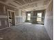 Bright bedroom with two windows and a view of the backyard at 76 Royal Ave, Selma, NC 27576
