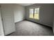 Bedroom featuring carpet floors and natural light at 76 Royal Ave, Selma, NC 27576