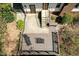 Aerial view of back deck, patio, and landscaped yard at 7605 Mine Valley Rd, Raleigh, NC 27615