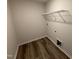 Laundry room with hardwood floors and washer/dryer hookups at 8 W Emily Gardens Dr, Selma, NC 27576
