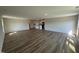 Spacious living room with hardwood flooring and natural light, perfect for entertaining and relaxing at 8 W Emily Gardens Dr, Selma, NC 27576