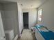 Bathroom featuring a shower-tub combination, vanity and a window at 8 W Emily Gardens Dr, Selma, NC 27577